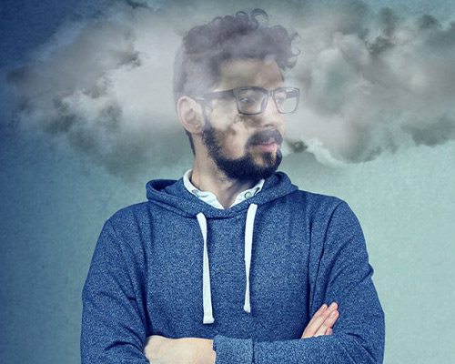 Man with fog over head